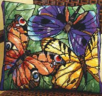 Подушка с разноцветными бабочками