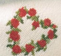 Схема вышивки крестом: Сердечко с красными цветами