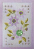 Схема вышивки крестом: Нежные цветы с украшениями