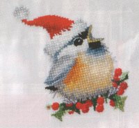 Птичка снегирь в красной шапке