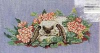 Схема вышивки крестом: Кролик в кусте с цветами