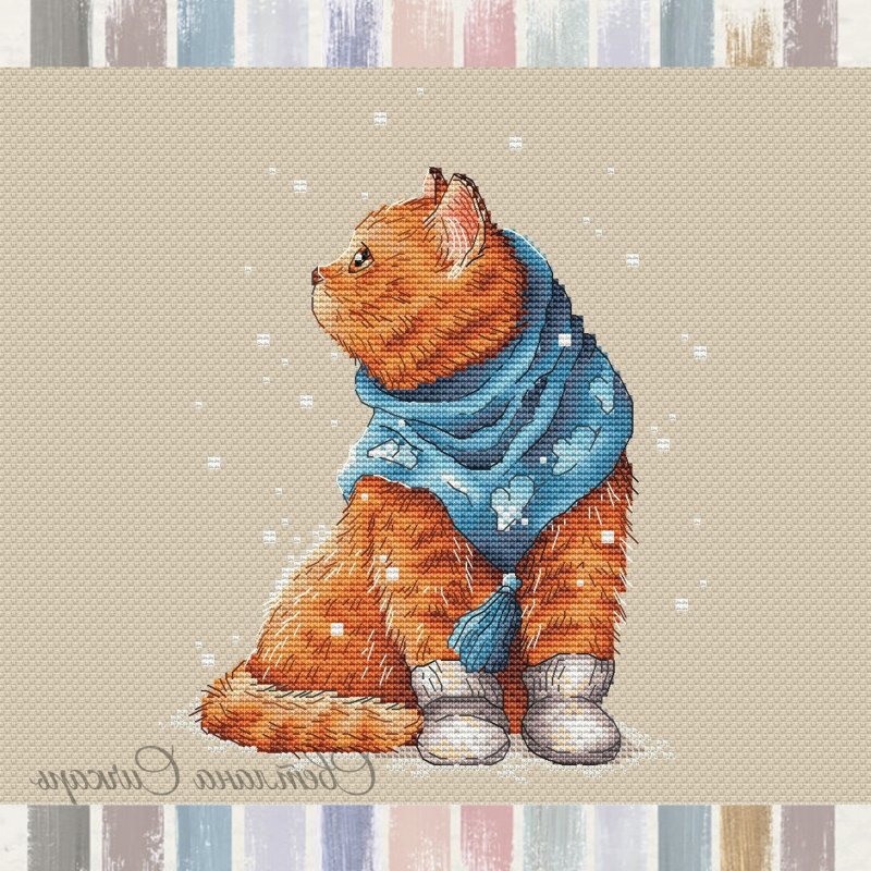 Котёнок в шарфе и варежках